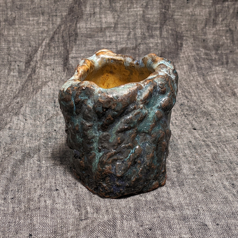 Stoneware Cup,Sake Cup, Sipper,Contemporary Ceramics,Carved Clay,Kurinuki, Kurinuki Cup,Ceramic Cup,Rustic Tableware, Wabisabi Ceramics,Wabisabi,Footed Cup,Carved Out Technique,Functional Ceramics,Inspired by Nature,Oxides,Brute Ceramics, Sculptural Ceramics,Hudson Valley Ceramics,Asymmetric,Gregory Arnett Studios,Nature Inspired Design,Sculptural Texture,Stone Texture,Handmade,OOAK,One of a Kind
